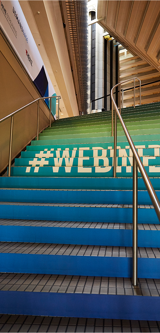 colorful gradient stairs with hashtag event environmental design