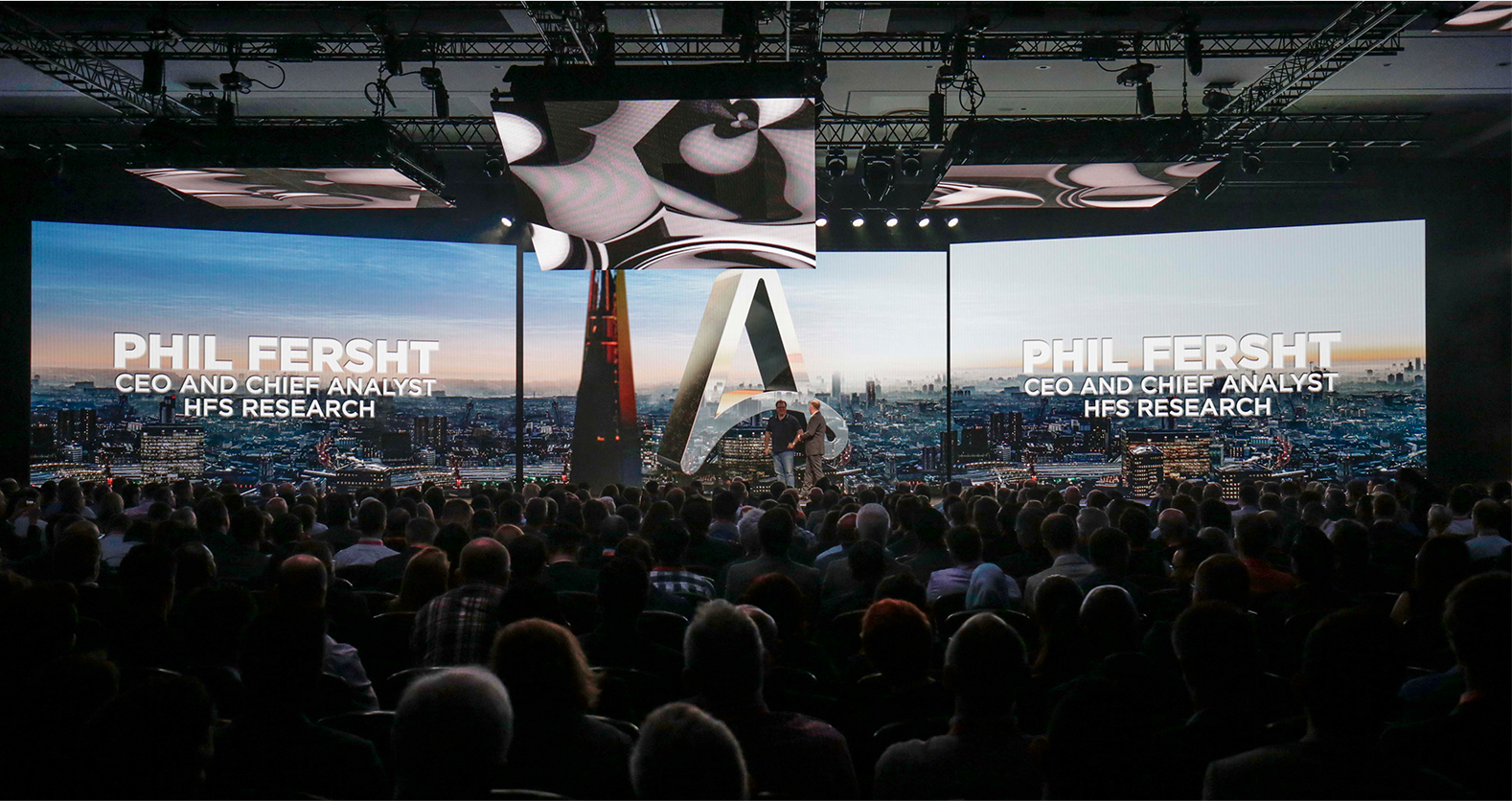 phil fersht speaking on stage
