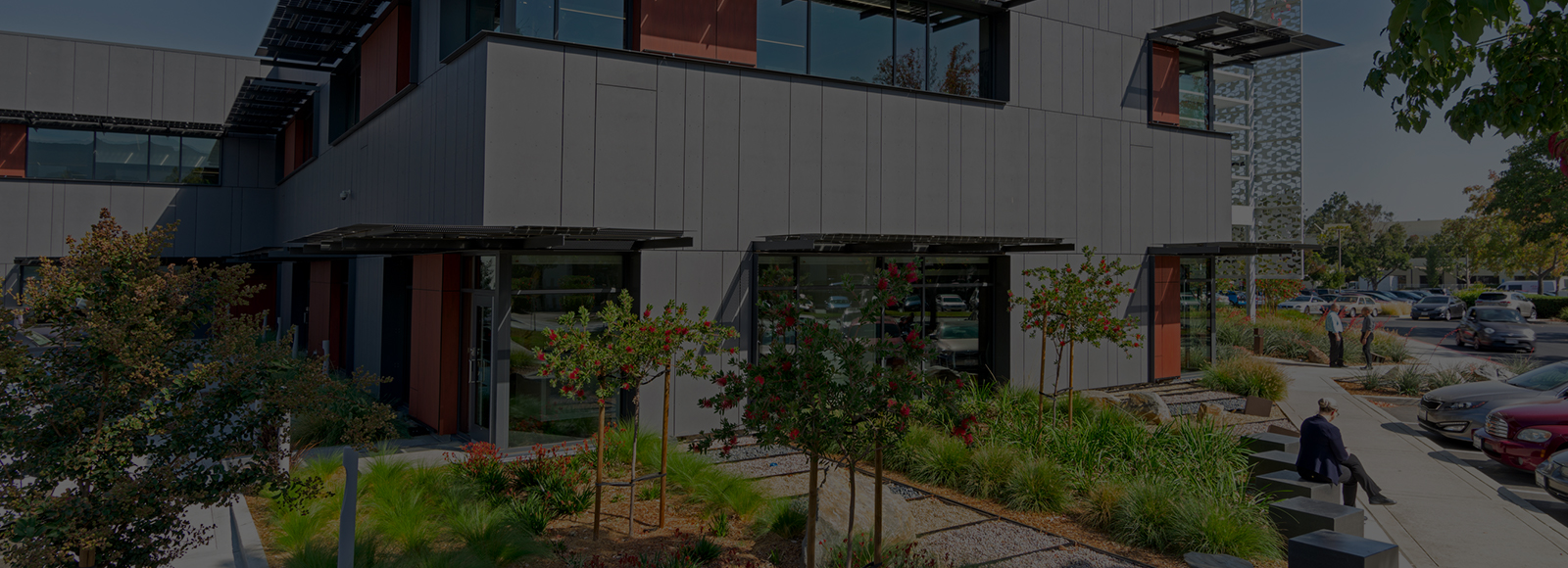 Modern building exterior and parking lot