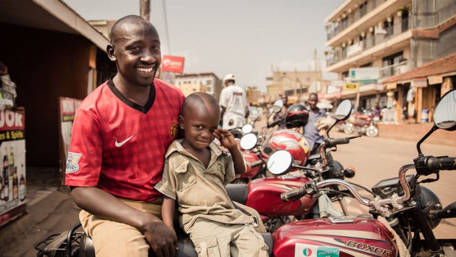 father and son on a motorcycle