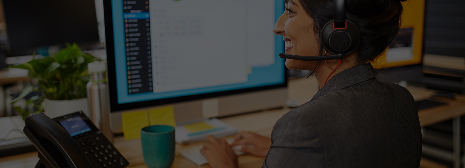 Broadvoice-Header-Woman-Headset broadvoice header smiling woman with headset