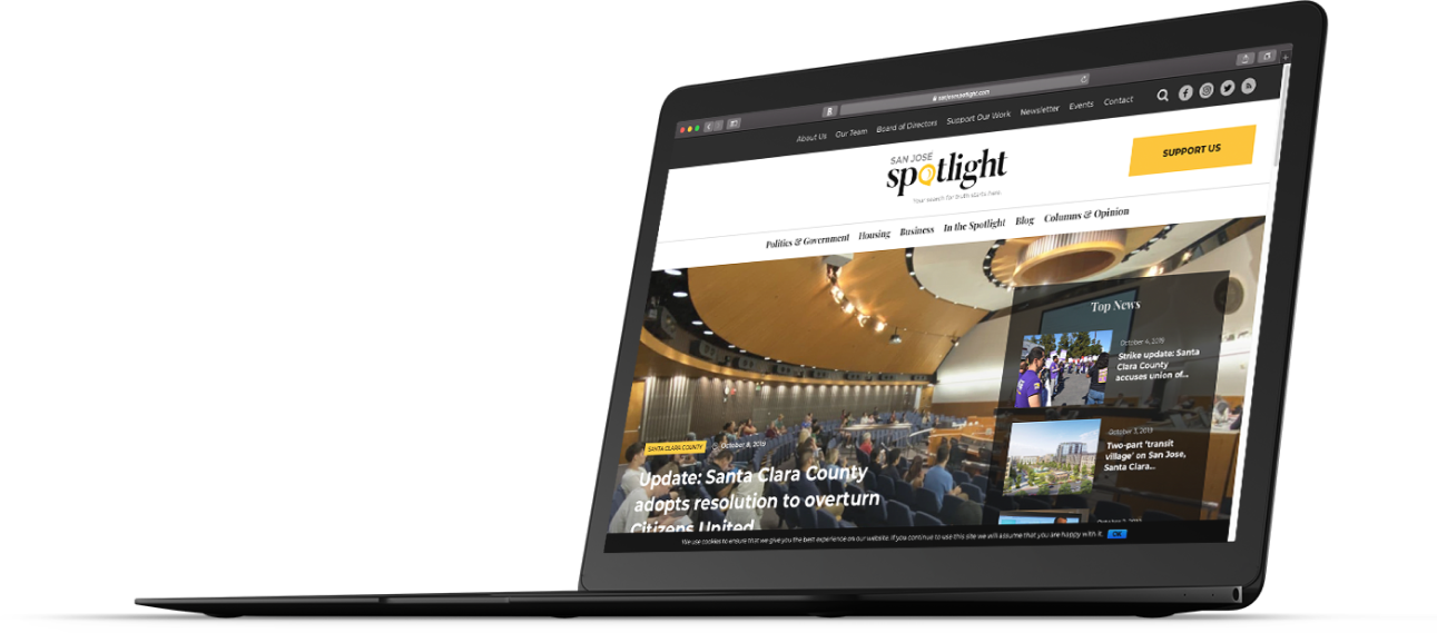 san jose spotlight web design mockup on laptop