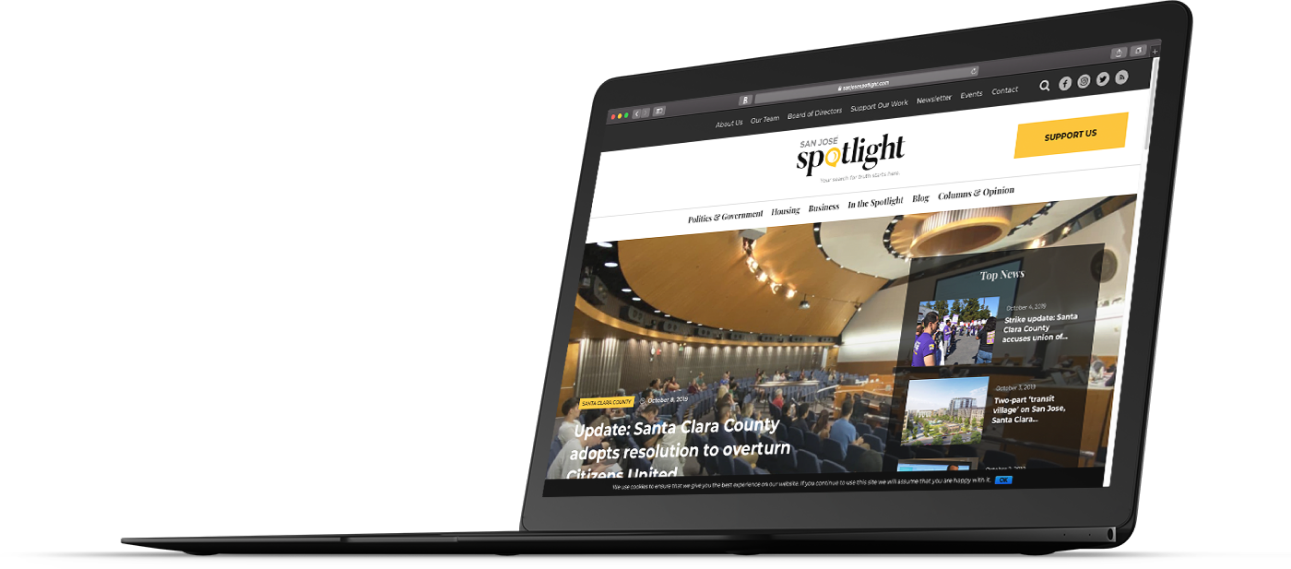 san jose spotlight web design mockup on laptop