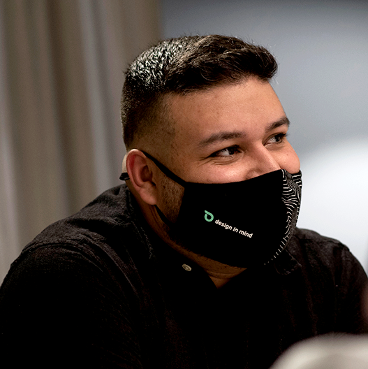 Raymond wearing branded mask