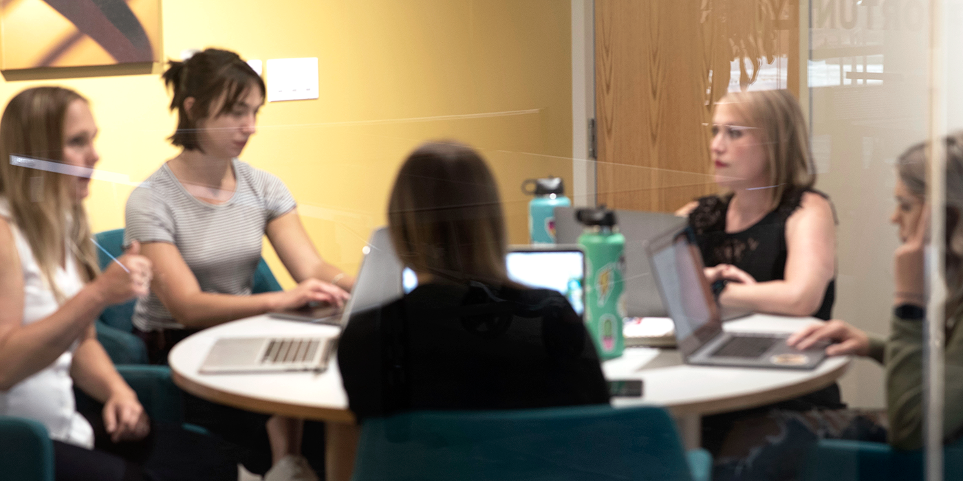 Team brainstorm in meeting room